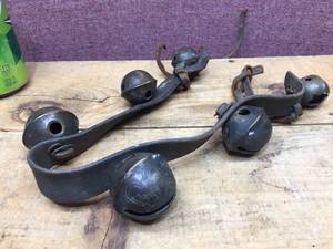 lot 129 image: Antique Brass Bells on Leather Strap - Jingle All The Way