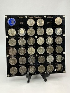 lot 4 image: Complete 33pc Ike Collections in Capital Plastic Frame