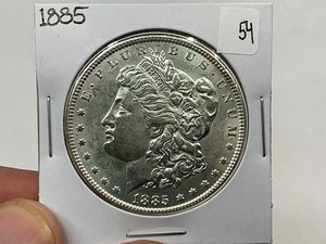 lot 54 image: 1885 Silver Morgan Dollar