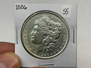 lot 55 image: 1886 Silver Morgan Dollar