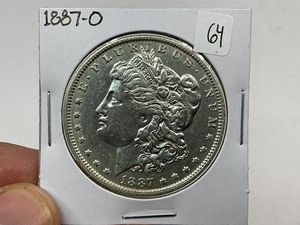 lot 64 image: 1887-O Silver Morgan Dollar