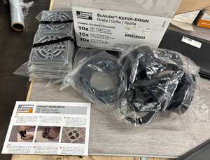 lot 62 image: SCHLUTER KERDI PVC DRAIN KIT 10 PACK