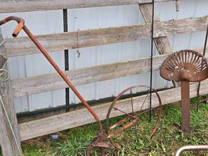 lot 87 image: Vintage Cultivator and Tractor Seat