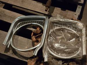 lot 131 image: Vintage Dodge Headlight Bezels