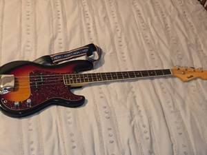 lot 500 image: Precision Bass Guitar - Bently by Fender with Case