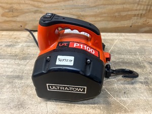 lot 57 image: Ultra-Tow Portable Electric Winch, 120V, 1100-Lb. Horizontal and Vertical Capacity, Brushless Motor (missing cable) MSRP $224.99