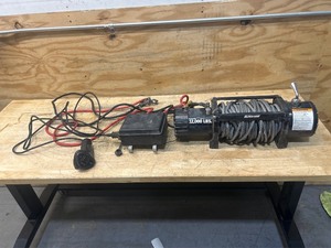 lot 105 image: Ultra-Tow 12 Volt DC-Powered Off-Road Vehicle Winch, 12,000-Lb. Capacity, Galvanized Wire Ropes MSRP $389.99