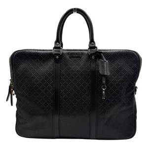 lot 31 image: Gucci Black Diamante Textured Leather Briefcase with Keys & COA Pre-Owned Retail $1,200
