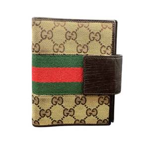 lot 39 image: Gucci GG Canvas Web Stripe Agenda Cover  Planner Pre-owned Retail $300