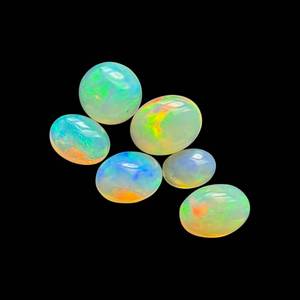 lot 20A image: 6.25 Carats Natural Welo Opals (6-Piece Parcel), Cabochon Cut, Fiery Color Play