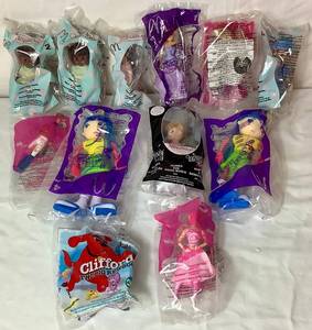 lot 45 image: McDonalds Happy Meal Toys - Dolls- Madame Alexander(5), Barbie (2), Betty Spaghetty (2) and Barbie(2) and 1 Clifford Wendys Kids Meal Dog