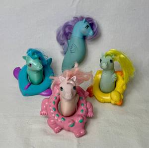 lot 65 image: Vintage My Little Pony Sea Pony and Baby Sea Ponies and Pool Floats