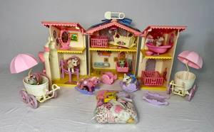 lot 64 image: Vintage My Little Pony Lullaby Nursery Playset, 2 Baby Buggy, Clothes, Little Pony Newborns and Accessories