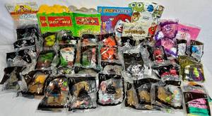 lot 43 image: Large Collection of McDonalds Happy Meal Toys including Jungle Book, Inspector Gadget, Cars, Tonka, Barbie, Walt Disney, Nemo, Battlebots, GI Joe, lego Clikits and Atlantis