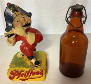 lot 110 image: Pfeiffer Brewing Company Chalkware Statue and Antique Glass Beer Bottle with Cap