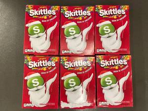 lot 57 image: Trol - Lot of 6 Skittles Book of Awesome Holiday Candy Boxes