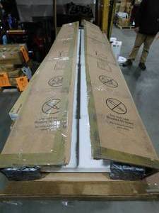 lot 71 image: (2) 16 in. x 80 in. x 1-38 in. 2-Panel Raised Square Top, Ovolo Sticking, Full and Square, Primed Wood Door Slab