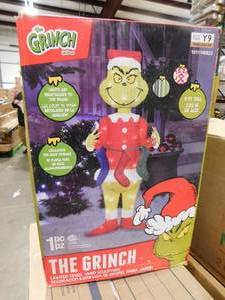 lot 111 image: Gemmy 3D Holiday Lighted Tinsel Sculpture The Grinch wStockings 4ft. Dr. Seuss, Multicolored