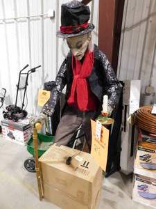 lot 212 image: Animated Scrooge Decoration