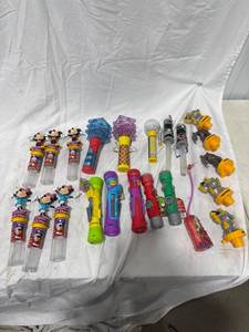 lot 0512 image: Candy Dispensers & Flashlight Toys