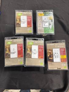 lot 0654 image: Lutron Dimmer and Fan Switches
