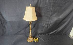 lot 56 image: Classic Brass Table Lamp with Ornate Base and Cream Shade