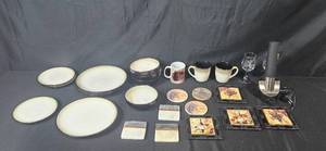 lot 58 image: Kitchen and Dining Set with Sango Nova Black Dishes, Wine Opener, Wine-Themed Coasters, Mugs, and Glassware