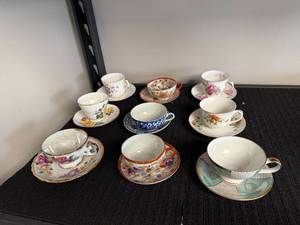 lot 97 image: Set of Vintage Floral Porcelain Tea Cups and Saucers Mixed Patterns