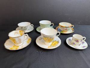 lot 109 image: Collection of 6 Vintage Teacup and Saucer Sets - Royal Albert, Hand Painted Japan, and Assorted Designs