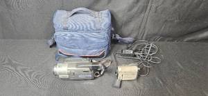 lot 155 image: Sony Handycam MiniDV Camcorder with Carl Zeiss 40x Optical Zoom, Battery, Charger, and Case