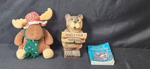 lot 159 image: Gund Igor Plush Moose, Bear Welcome Figurine, and Birds of Minnesota Field Guide Book