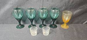lot 223 image: Set of 4 Green Glass Goblets, 1 Amber Goblet, and 2 Small Clear Glasses