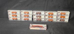 lot 226 image: Atlas N Scale Model Railroad Cars and Locomotive Collection in Boxes - miniatures