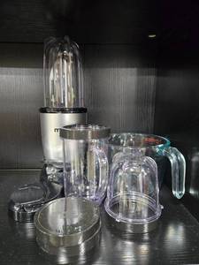 lot 267 image: Magic Bullet Blender Set with Extra Cups, Lids, and Pyrex Measuring Cup