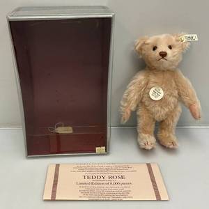 lot 14 image: Vintage Steiff Replica Limited Edition Of 8,000 Teddy Rose 1925 Bear 15 Ear Tag #407154 (00413) Curly Pink Mohair Fully Jointed Body, Growler, Glass Eyes, Pink Felt Paw Pads New Old Stock in Original Box With COA