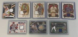 lot 105 image: Misc. Baseball Patch Cards In Double Protective Sleeves