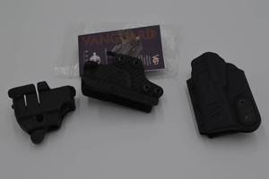 lot 64 image: Gun and Magazine Holsters