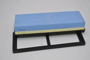 lot 94 image: Dual Sided Sharpening Stone