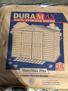 lot 18 image: Storemax 10 ft. x 8 ft. Gray Vinyl Storage Plastic Shed Customer Returns See Pictures