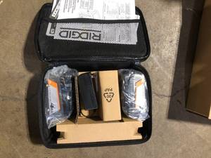 lot 65 image: RIDGID 18V Lithium-Ion 4.0 Ah Battery (2-Pack) and charger  Customer Returns See Pictures