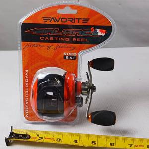 lot 89 image: NIB � Bait Caster Reel