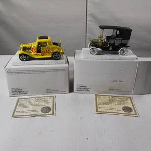 lot 96 image: NIB 911 FB Ford Town Car with Certificates of Authenticity � 1932 3 window hot-rod