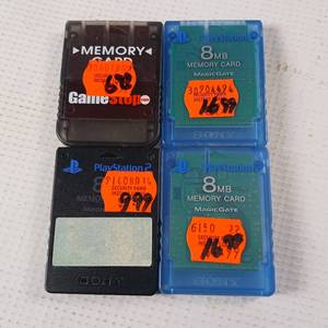 lot 109 image: 8 MB, x3 - Playstation 2 memory cards, magic gate Sony brand. One extra, size not marked - 4 total