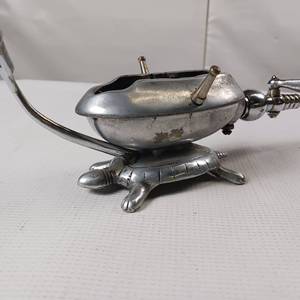 lot 121 image: Vintage Turtle based iron heating base