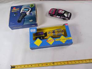 lot 141 image: Power Launcher Hot Wheels and 99 NasCar