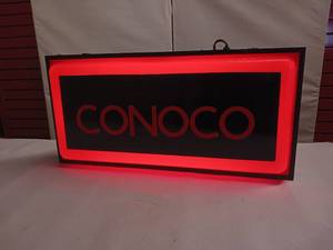 lot 196 image: Lighted Conoco Advertising Sign - Two Sided - Works Dimensions are approx 22 x 12 Inches