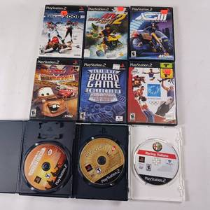 lot 211 image: PS2 - Lot of 9 Games - Cars - Desert Storm - DaVinci Code - Biathlon and more
