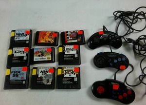 lot 1 image: Sega Games and Remotes � Vintage Retro 90s � NHL 98 � FIFA 96 � Monopoly- Lion King - NBA Jam