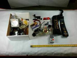lot 233 image: Guitar Accessories � Guitar Stand  - Box o Pics � Lots of Strings � Tools � Whammy Bar � Tuner Crank � Pitch Tester � MXR Full bore metal foot pedal
