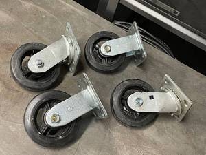 lot 23ZA image: Set of 4 Heavy-Duty 5x1.5 Swivel Caster Wheels for Industrial Use
